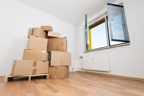 Local removal van moving boxes and belongings around Canary Wharf