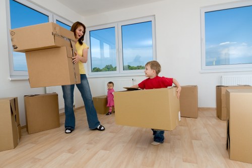 Careful loading of household furniture for a move in Canary Wharf